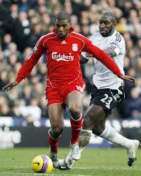 Photo shows 1968 xmas day hull derby & an injured artie beetson. Liverpool S Ryan Babel L And Derby County S Darren Moore R During The English Premier League Soccer Match In England On December 26 2007 Photogallery