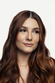 Optimistic Young Woman in Denim Jacket · Free Stock Photo