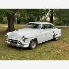 Image result for Regent Maroon 1952 Oldsmobile