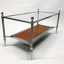 Brass with bronze base comes with a cut glass top. Vintage Coffee Table By Maison Jansen 1940s 88319