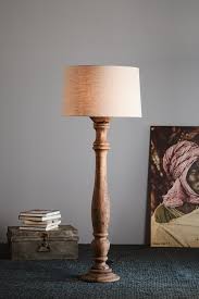 An Elegant Candlestick Style Turned Wood Floor Lamp In A Dark Mango Wood Finished With A Drum Shade Wood Candle Sticks Table Lamp Wood Wood Floor Lamp