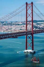 This sister bridge of the san francisco golden gate bridge was designed by the same architect in 1966 to connect lisbon with the setubal peninsula across the tagus (tejo) river. Lisbon Bridge Vs Golden Gate
