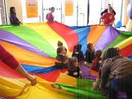 Parachute Game Where The Kids Sit On The Chute And The Parents Rotate It In A Circle Fun For Strong Toddler Movement Activities Baby Storytime Yoga For Kids