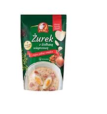 Lekko gęsty, przyjemnie kwaskowy, o bogatym smaku wędzonki i majeranku. Grosshandelpl Profi Sauerteigsuppe Zurek Mit Real De