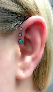 Pin By Natalia Pintado On Ear Art Body Piercing By Qui Qui Ear Piercings Ear Piercing Combinations Emerald Earrings Studs