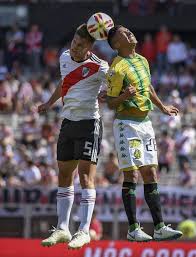 Bruno zuculini of river plate competes for the ball with esteban rolon and franco cristaldo of huracan during a zona campeonato match between huracan. Copa Libertadores River Plate Star Bruno Zuculini A Fitting Symbol For The Chaos Undermining South American Football