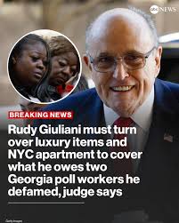 BREAKING: Rudy Giuliani has seven days to turn over luxury items and shares  of his New York City co-op apartment to cover much of what he owes to two  Georgia poll workers