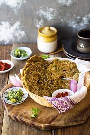 When sliced, 1 medium zucchini yielded about 1 to 1.25 cups and if grated, you end up with about 2/3 cup of tamped down zucchini. Zucchini Thalipeeth A Bit Wholesomely