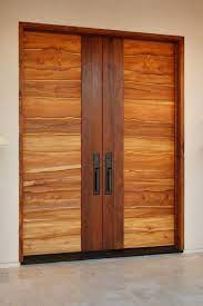 In natural veneer door faces, there is no predictability of how and where the heartwood and sap wood will appear. Love These Organic Doors By Jory Brigham Wood Doors Interior Wooden Front Doors Wooden Door Design
