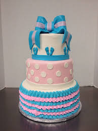 This 3 Tier Baby Shower Cake In Pink And Blue Has No Specific Theme But Has Fun Polka Dots Ruffles Baby Feet And 2 Color Baby Shower Cakes Cake Shower Cakes