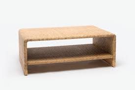 While choosing a coffee table may feel like both an overwhelming and an unsexy task. Woven Rattan Coffee Table Mecox Gardens