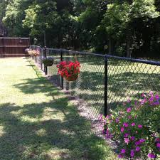 My Hanging Baskets On The Chain Link Fence Adding More Soon Chain Link Fence Backyard Fences Fence Decor