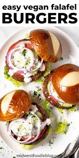Easy Vegan Falafel Burgers With Yogurt Sauce Recipe Falafel Burgers Easy Vegan Vegan Burgers