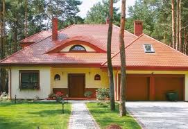 This modern lake house has multiple sloped roofs to allow the rain and snow slide off. Feng Shui Home Design With Roof Style