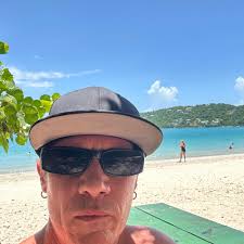 Who is the young man selling bat boxes in St. Thomas?