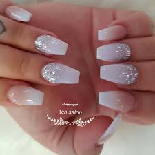 A light color on the top of the nail gradually blends into a i tried the glitter ombre for prom, and they were beautiful! Ombre And Glitter Acrylic Nails Don T Ten Salon Napier Facebook