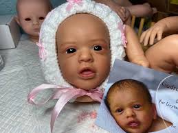 Sue's reborns and baby knits.