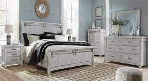 Sleigh bedroom set kids bedroom sets living room sets bedroom ideas bedroom decor upholstered bedroom set upholstered platform featuring 2 sliding barn door styled cabinet fronts for a versatile design where you can either close off the middle or both sides, depending on your needs. Ashley Brashland Bedroom Collection