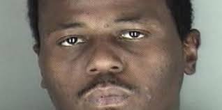 Topeka police ID man they saw threw a rock through glass doors of Law  Enforcement Center