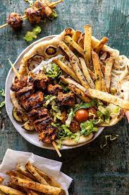 Chicken Souvlaki Bowls With Garlic Fries Half Baked Harvest Recipe Chicken Souvlaki Food Recipes