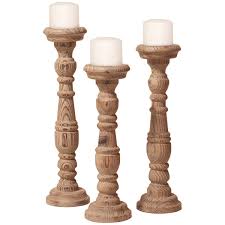 3 pieces of 4x4 scrap wood i had laying around, a stencil of a primitive star cut out of pallet scraps, and mason jar lids painted with textured spray paint, with some crafty touches. Howard Elliott Carved Natural Wood Candle Holders Set Of 3