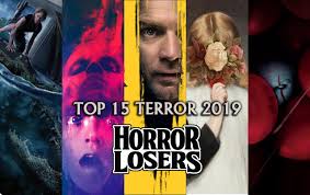 A su lado, se encuentra otra persona encadenada, el dr. Horror Losers Las 15 Mejores Peliculas De Terror De 2019