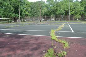 The court has a flat surface with marks on it tennis player equipment is as follows: 01 23 2018 Long Time Coming Berlin Tennis Court Project Moving Ahead News Ocean City Md
