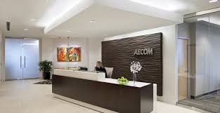 Glass Doors To Back Wall Textured Tiles With Logo Law Office Decor Office Interior Design Office Lobby Design