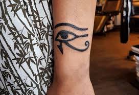 It's similar in appearance to an ankh, but the difference is that the tyet's arms face downwards. Egyptian Tattoo Meanings Ink Vivo