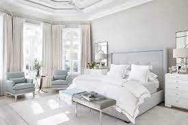 Lovely Gray Bedroom Showcases A Stunning Dove Gray Velvet Bed Accented With A Dove Gray Velvet Tufted Headb White Bedroom Decor Serene Bedroom Relaxing Bedroom