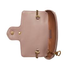 A stitched heart on the back of the bag gives this cute and chic mini bag a sweet touch. Gucci Gg Marmont Matelasse Leather Super Mini Bag In Beige Natural Lyst