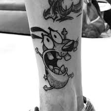 The black heart tattoo is symbolic of dark, mysterious feelings and is done with intricate detailing. 70 Cartoon Tattoos For Men Animation Ink Design Ideas Courage Tattoos Cartoon Tattoos Tattoos For Guys
