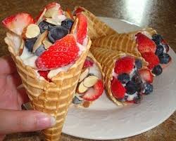 Freeze Yogurt In Waffle Cone And Put Strawberries And Almonds On It Makingbetterchoices Yumm Snack Recipes Food Delicious Desserts