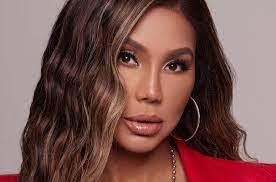 Traci Braxton 2025: Husband, net worth, tattoos, smoking & body  measurements
