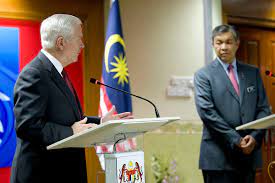 The minister administers the portfolio through the ministry of defence. File Defense Gov News Photo 101109 D 7203c 023 Secretary Of Defense Robert M Gates And Malaysian Defense Minister Ahmad Zahid Hamidi Conduct A Joint Press Conference In The Defense Ministry Jpg Wikimedia Commons