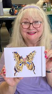 Here is my very first painting I did last year in medium acrylic, and glow  in dark acrylic..named it Butterfly Kisses... I sold it within 2 weeks