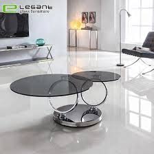 The strong and durable glass top will support a variety of items like laptops, plates, magazines, and. China Exotic Double Sided Rotatable Glass Coffee Table With Tempered Glass Top China Coffee Tables Tables