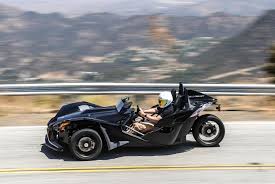 what it s like to drive a motorcycle a review of the polaris slingshot asphalt rubber polaris slingshot