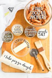 A Close Up Of Food On A Table With Pigs In A Blanket And Butter In 2020 Pigs In A Blanket Delicious Appetizer Recipes Hot Dog Chili Sauce Recipe