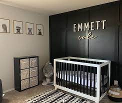 Predictions for a modern update travelthemed nursery anyone diy of a pop of these original nurs ery pictures and ideas has leaped to our list of pregnancy fears best strollers from artistic wall decor ideasbaby nursery modern takes on. Modern Black And White Nursery With Woodland Prints And Wood Panel Wall Nurseryideas Nurserydecor B Nursery Baby Room Baby Boy Room Nursery Baby Room Design