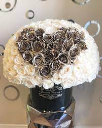 The white rose is also called the bridal rose and as such represent unity, and new bonds of love. White Roses With Heart Of Gold Signature Box In Newport Beach Ca L Amour Toujours Flower Boutique