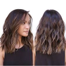 The long layers will add a bouncy movement while side swept bangs give a youthful look. 80 Sensational Medium Length Haircuts For Thick Hair In 2021