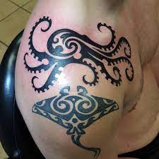 Realistic octopus tattoos can be very cool, but require a lot of skill from your tattoo artist, so nice locations for smaller octopus tattoos include the nape of your neck, foot, ankle, hip, wrist. Tribal Tattoos For Men Women Amazing Designs Ideas Tribal Tattoos For Men Tribal Tattoos Tattoos For Guys