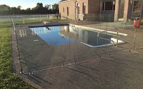 Be entirely enclosed by at least a five foot wall, fence or other barrier as measured on the exterior side of the wall, fence or barrier. Pool Fence Code Requirements Aquaview