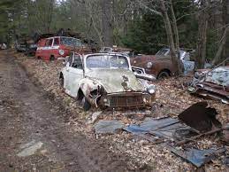 Mattie S Tireshop Consists Of Lots Of Beat Up Trucks And Old Rusted Car Parts Abandoned Cars Junkyard Classic Cars Trucks