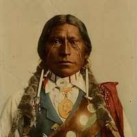 Native American Man Wearing a Bear Claw Necklace