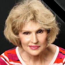 Whitney Houston, Kevin Costner and Whitney's hairstylist Ellin Lavar having  fun