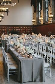 Family Style Reception With White Chiavari Chairs Gray Table Linens Candlelight And White Flowe Wedding Table Linens Gray Wedding Inspiration Wedding Linens