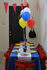 Table Decorations Pilot Setup Blue Satin Table Cloth White Table Runner Red Chair Sashes Balloons Blue Table Decorations Blue Table Party Themes For Boys