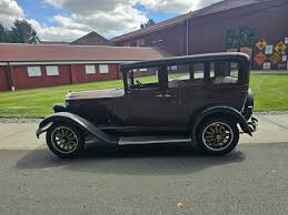 Image result for Washington Gray 1929 Oldsmobile